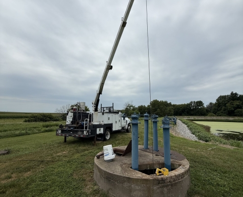 MVP service truck with crane at a rural well site